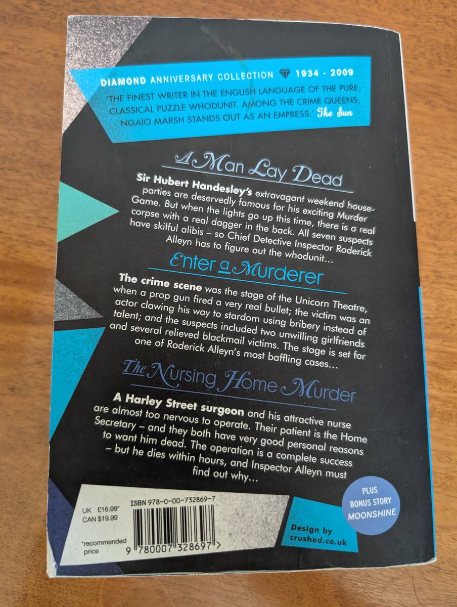 A photograph of the back cover of the 2009 paperback edition of Harper's Ngaio Marsh omnibus, containing 'A Man Lay Dying', 'Enter a Murderer' and 'The Nursing Home Murder'. One corner is dog-eared; condition is otherwise very good.