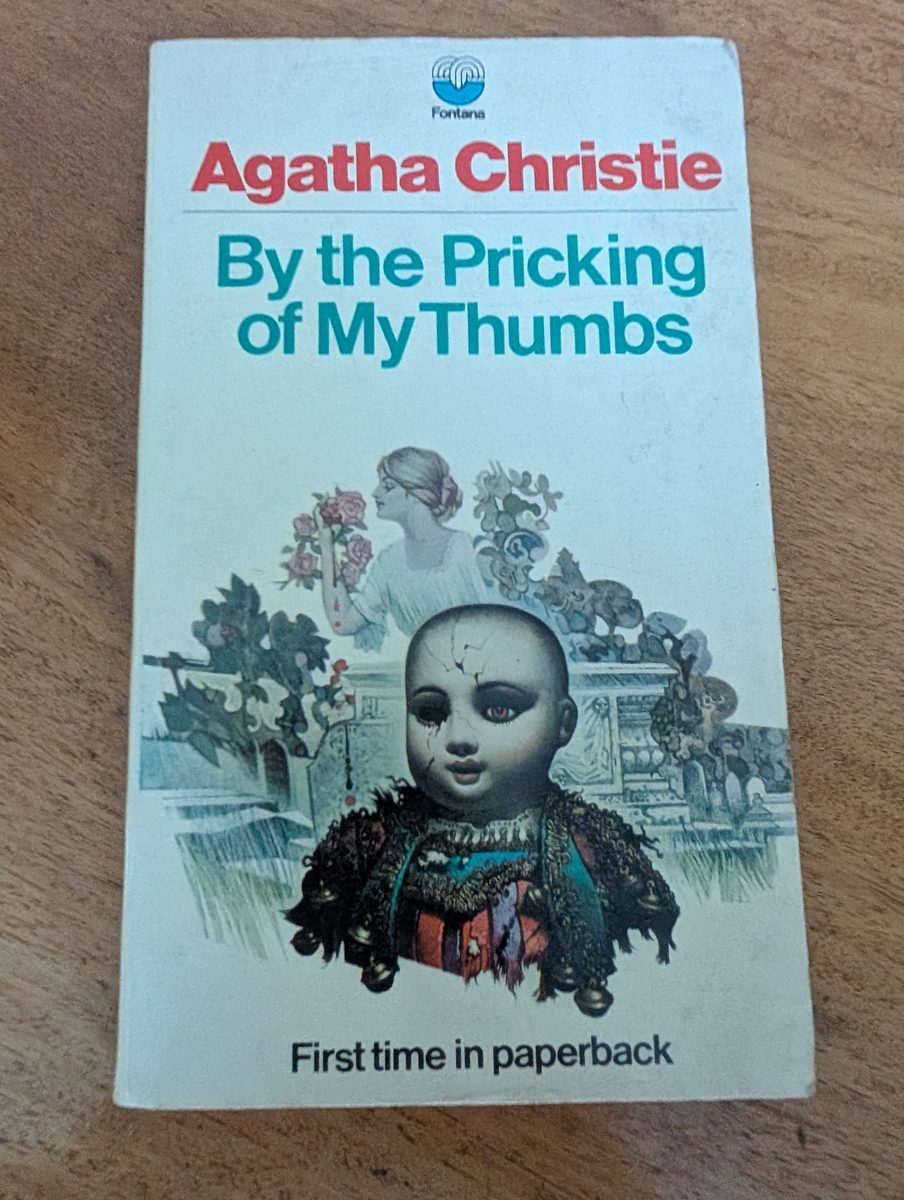 By the Pricking of My Thumbs by Agatha Christie - Fontana/Collins 1971 first paperback edition, cream cover with Tom Adams illustration of a cracked doll in a garden