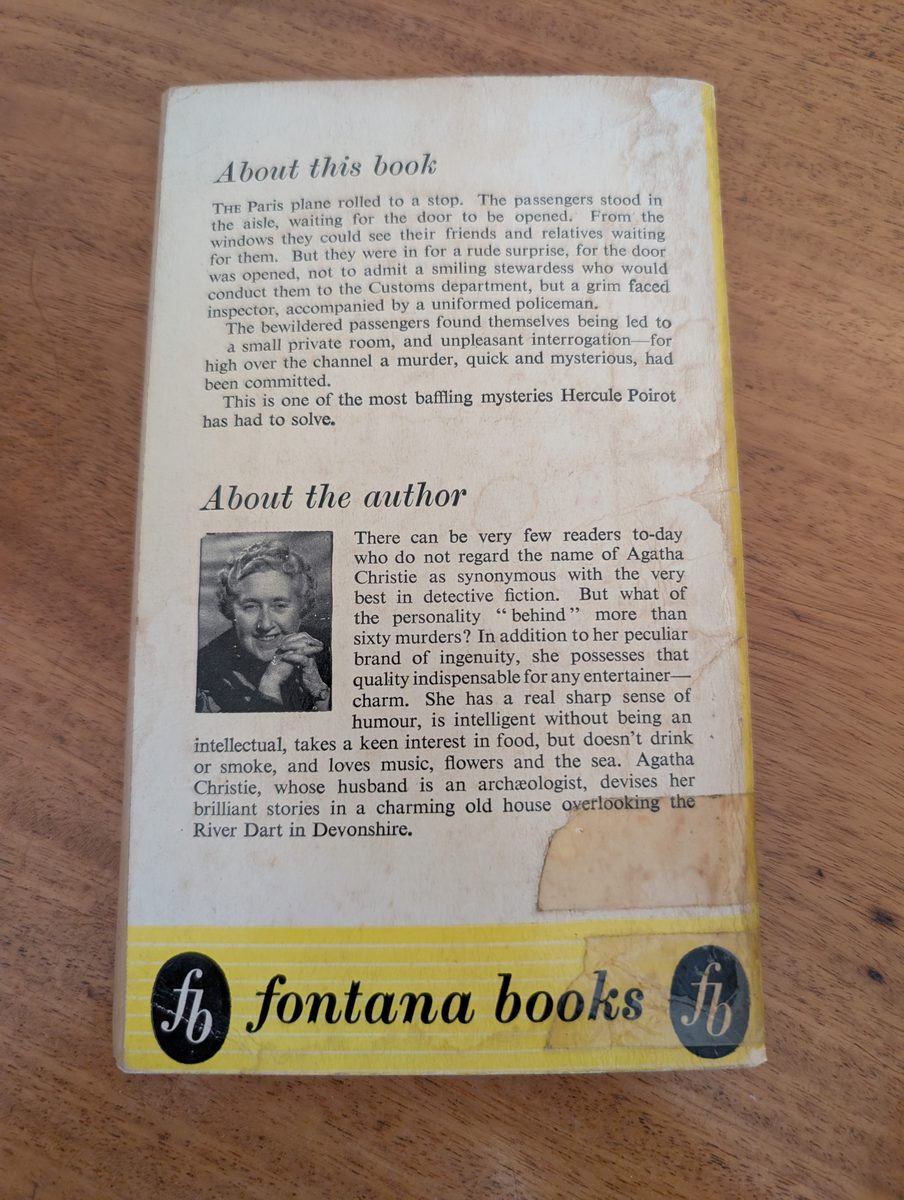 Back cover of Death in the Clouds by Agatha Christie