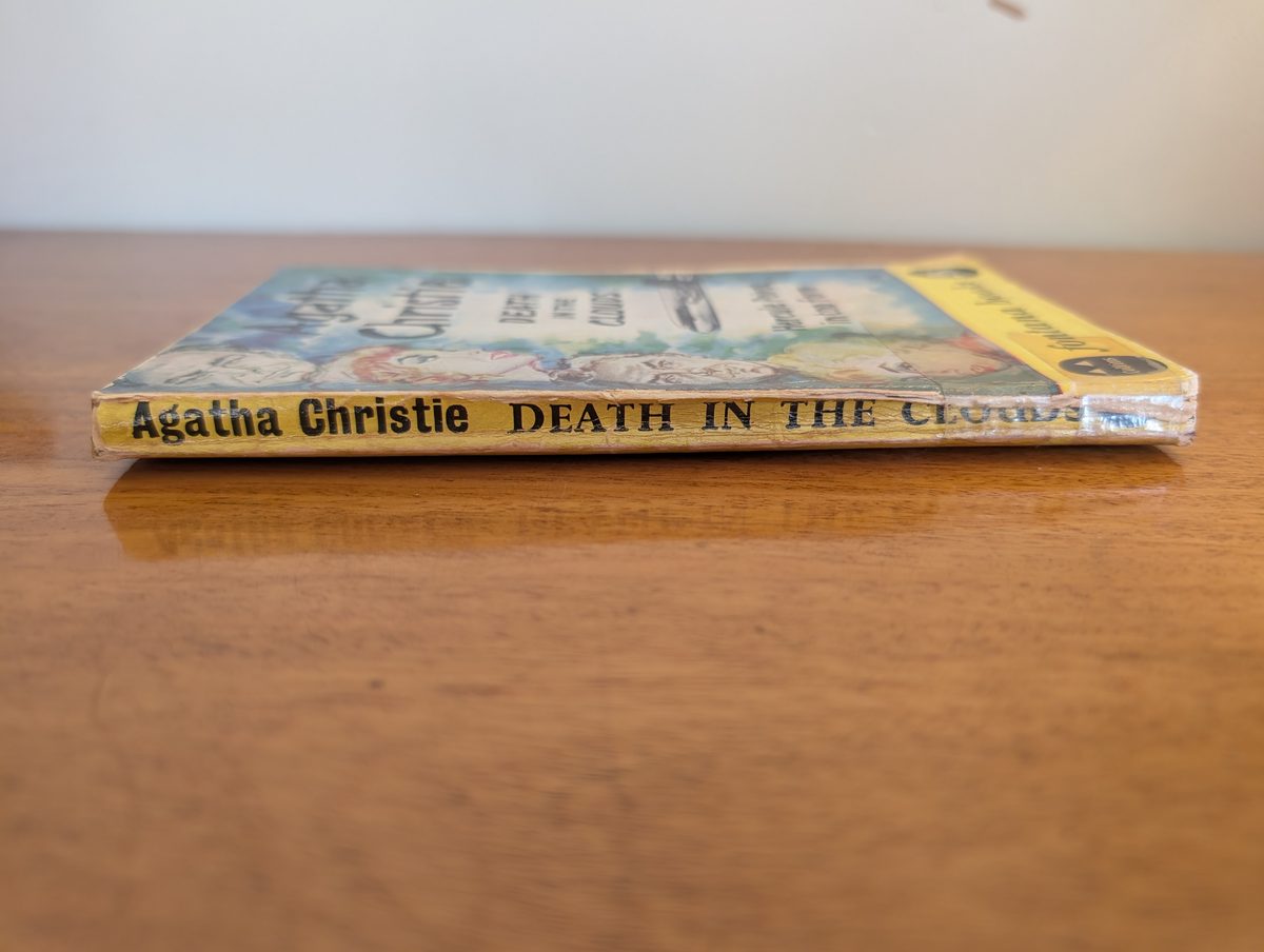 Spine of Death in the Clouds by Agatha Christie