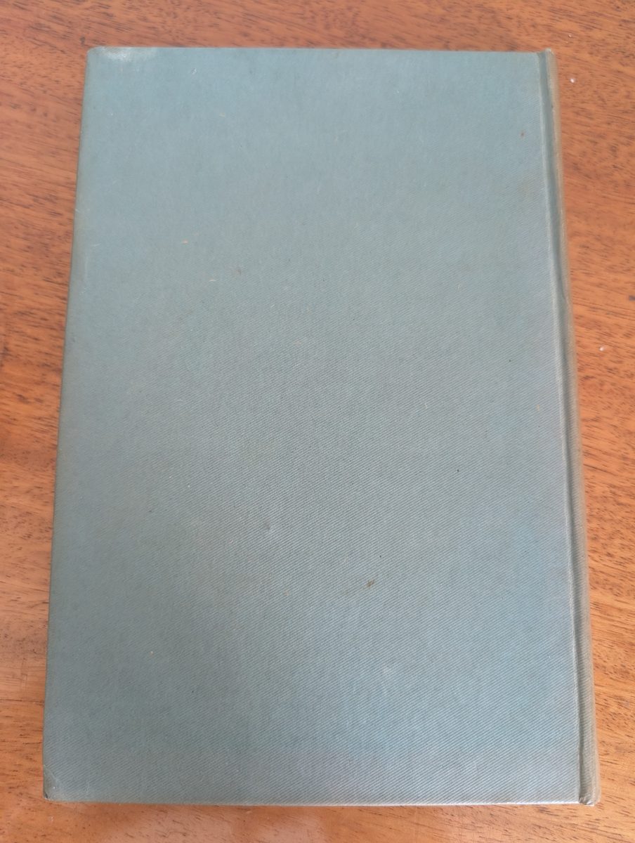Back board of In the Teeth of the Evidence by Dorothy L. Sayers