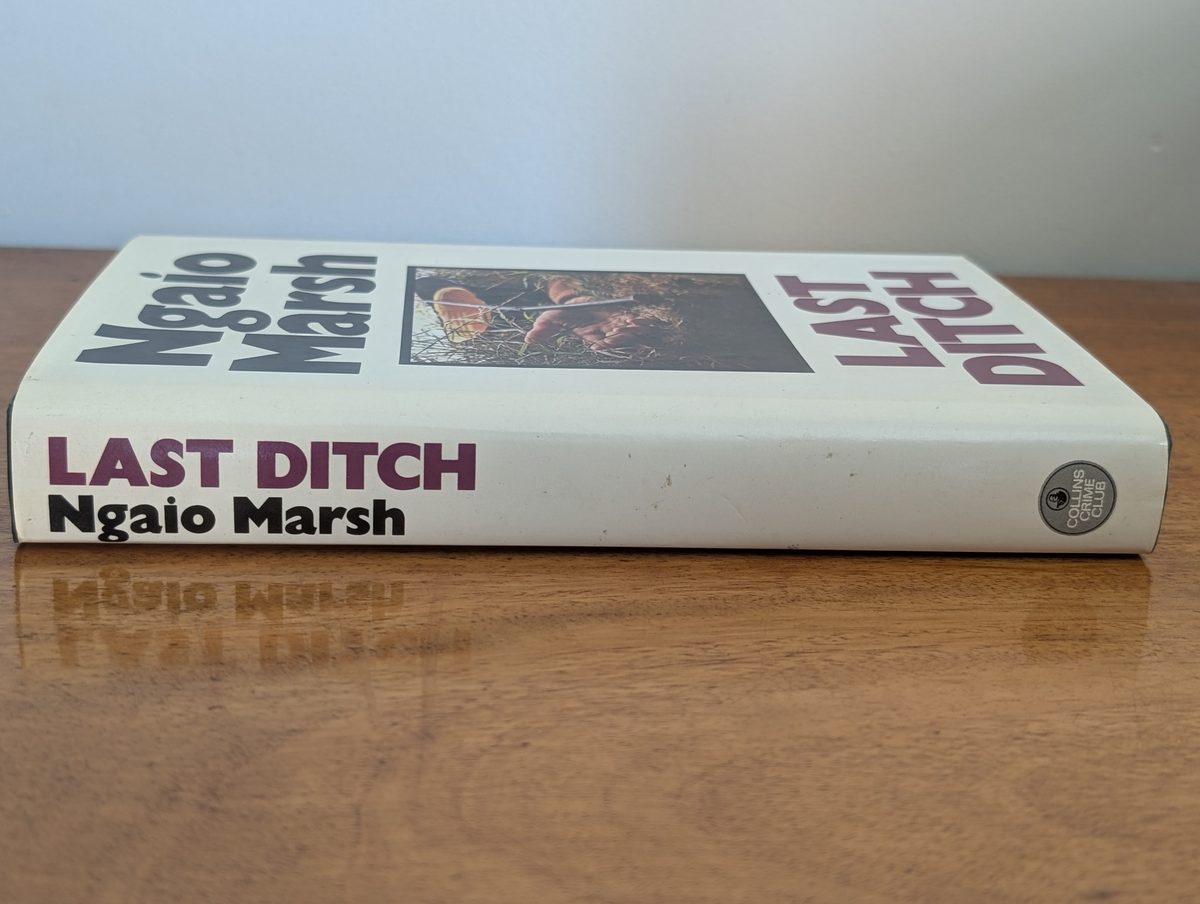 A photograph of the spine of Ngaio Marsh's 1977 Last Ditch (the UK hardback first edition).