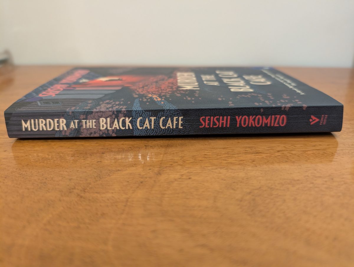 Spine of Murder at the Black Cat Cafe - Pushkin Vertigo 2025 paperback