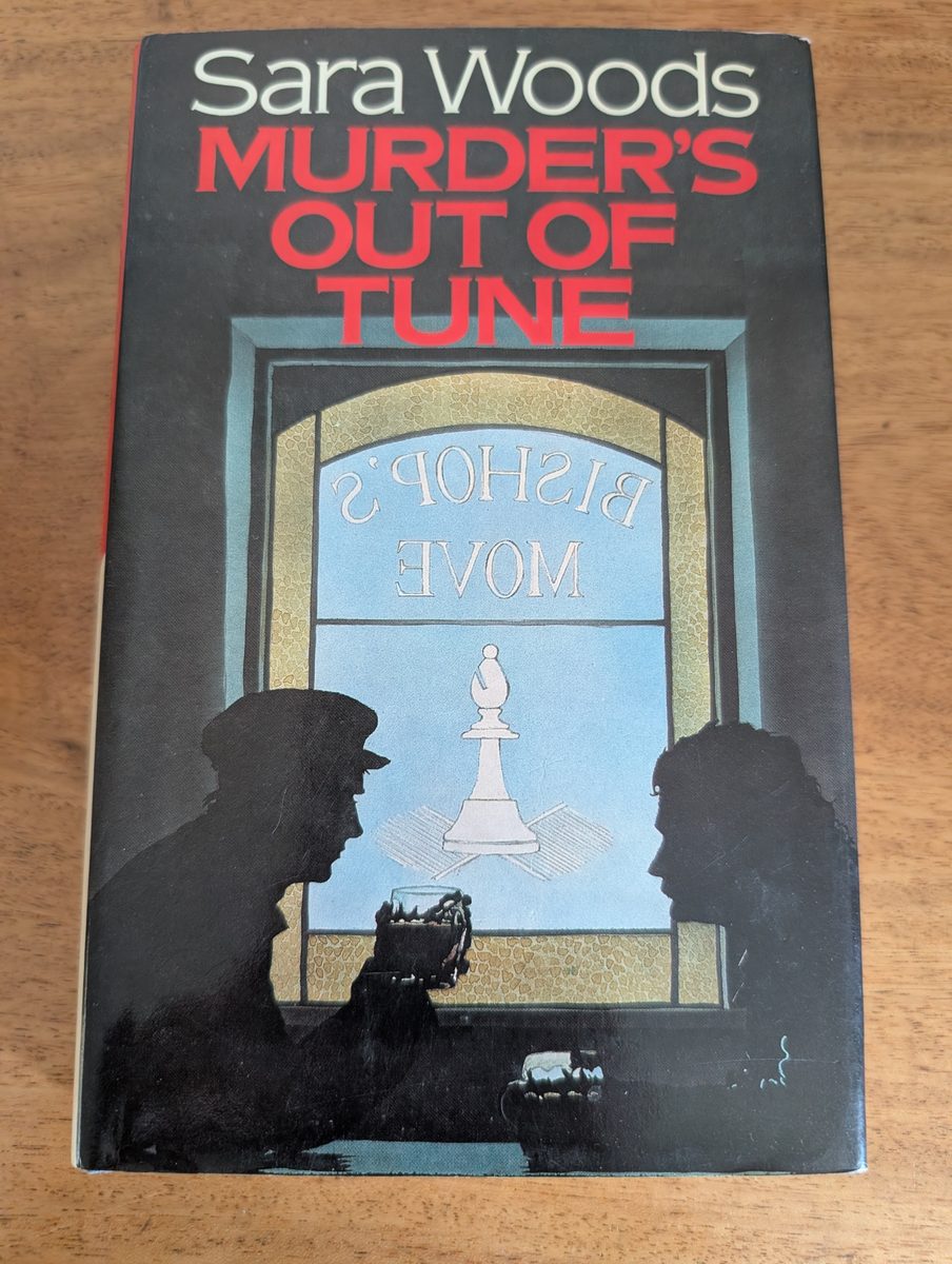 Front cover of Murder's Out of Tune by Sara Woods, Macmillan 1984 hardback with dust jacket