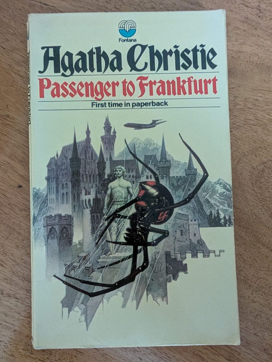 Passenger to Frankfurt by Agatha Christie - Fontana/Collins 1972 first paperback edition, cream cover with Tom Adams illustration of a castle, spider, and jet plane. 'First time in paperback' on cover.