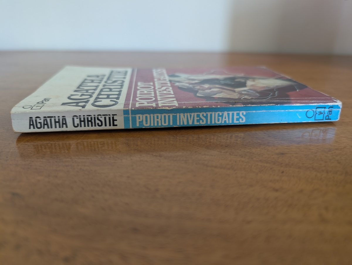 Spine of Poirot Investigates, Pan Books 1976 - white and blue two-tone