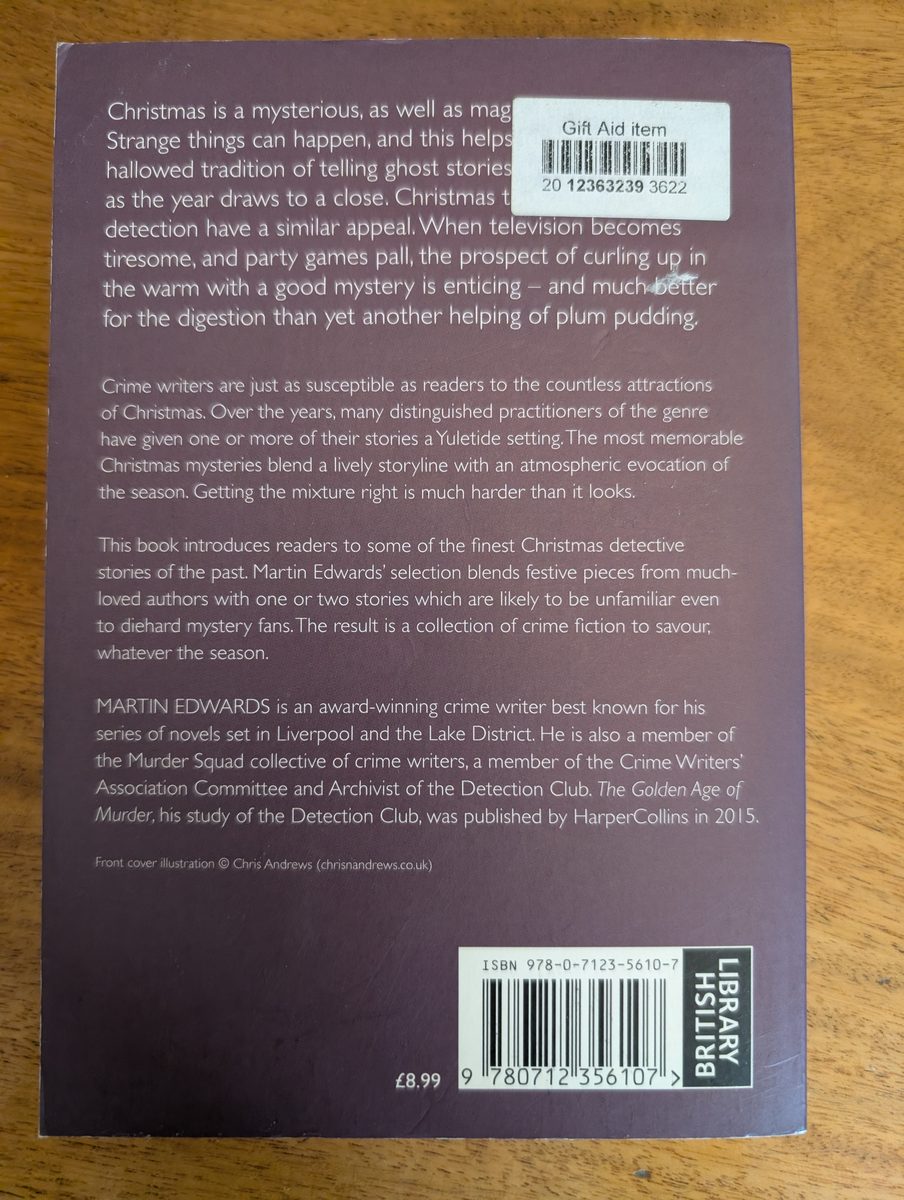Back cover of Silent Nights: Christmas Mysteries - British Library Crime Classics 2015 paperback, showing a Gift Aid sticker