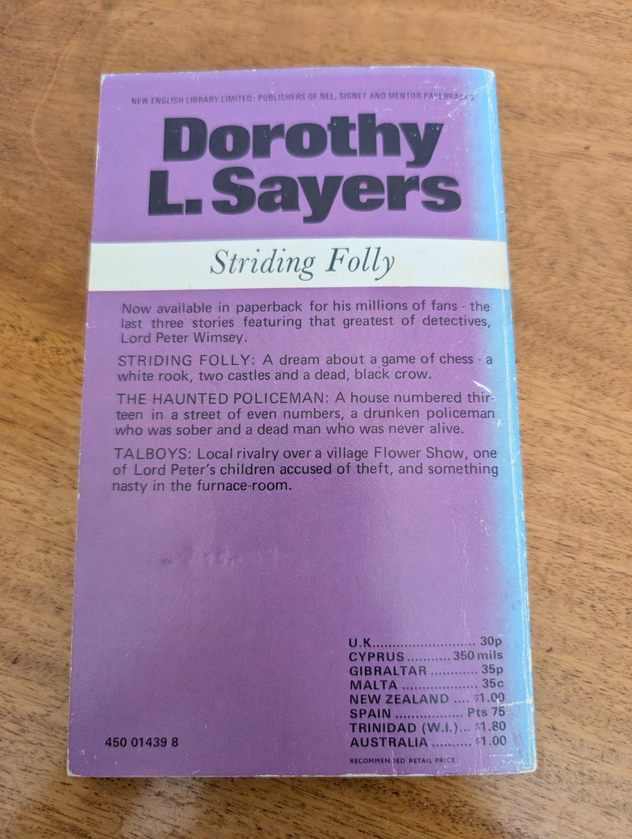 The back cover of the 1972 first New English Library paperback of Striding Folly by Dorothy L. Sayers. The lavender cover carries short synopses of the three stories — 'Striding Folly', 'The Haunted Policeman', and 'Talboys' — and international price listings for UK (30p), Cyprus, Gibraltar, Malta, New Zealand, Spain, Trinidad, and Australia.