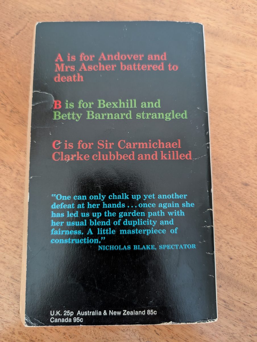 Back cover of The ABC Murders, Fontana/Collins 1972, with press quote and UK price of 25p - showing corner damage