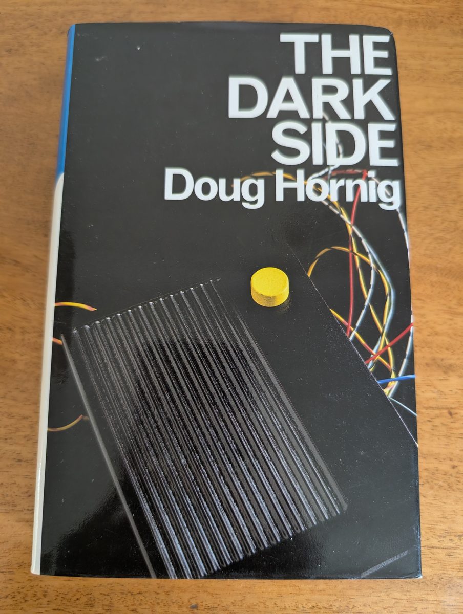 Front cover of The Dark Side by Doug Hornig, Macmillan 1987 hardback with dust jacket