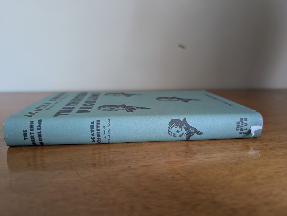 Spine of The Thirteen Problems by Agatha Christie