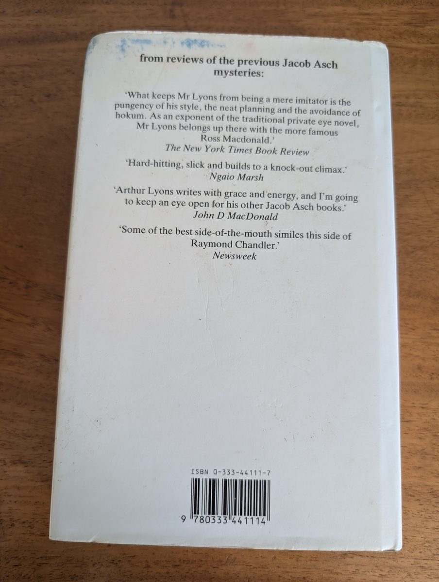 Back cover of Three With a Bullet by Arthur Lyons, Macmillan 1987 hardback